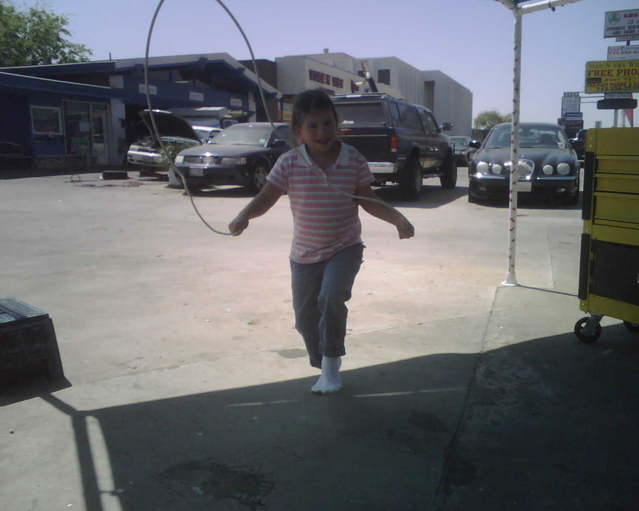 happy girl under repair tent
