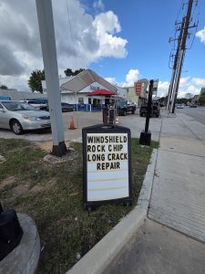Windshield Rock Chip Long Crack Repair Sign Sidewalk Richmond Ave and S Shepherd Houston TX corner - 2107 Richmond Ave