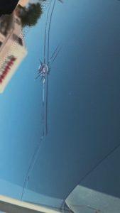 Fix big long crack Houston drill cone tape $50 windshield crack repair photo at Clint's Glass 2107 Richmond Ave - drill tip cone vacuum tape